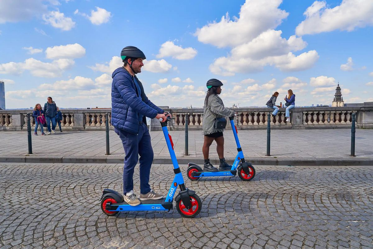 image of a person riding a Dott e-scooter